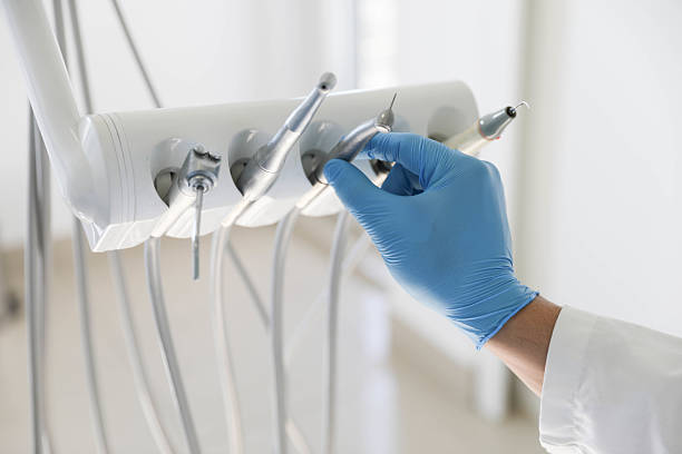 Professional Tooth Extraction technician working in Leesburg, VA